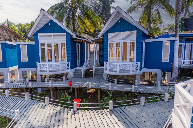 Twin villas framed by greenery